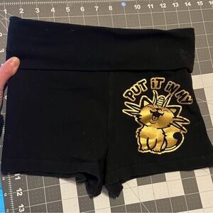 Put it in my Meowth black and gold foil print booty shorts